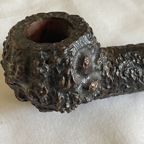 Handmade Czech wooden smoking pipe used with signs of wear