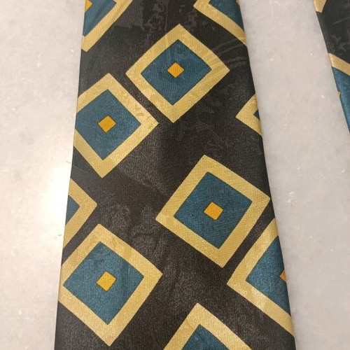 Tarlazi silk tie like new, blue with geometric shapes