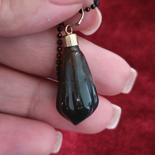 Long necklace used with black beads and hematite pendants