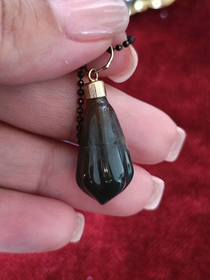 Long necklace used with black beads and hematite pendants