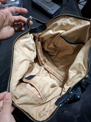 Handbag like new, original design with many compartments