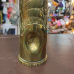 Vase from old shell used, bronze