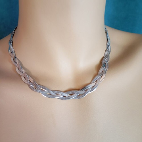 Stainless steel braided necklace new, silver color