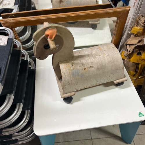 Wooden children's horse toy used with wear