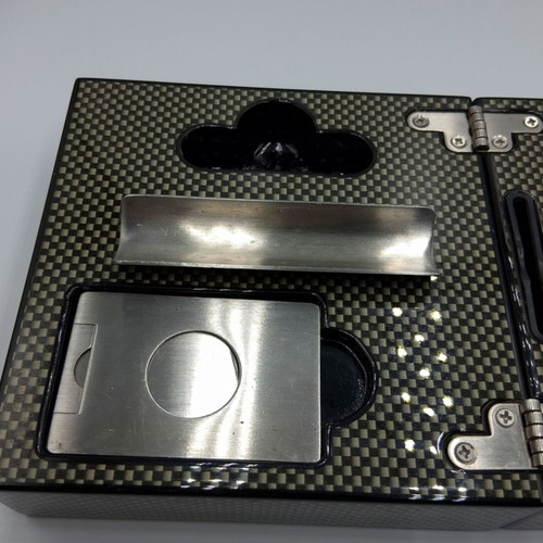 Cigar accessory set box like new with carbon fiber finish