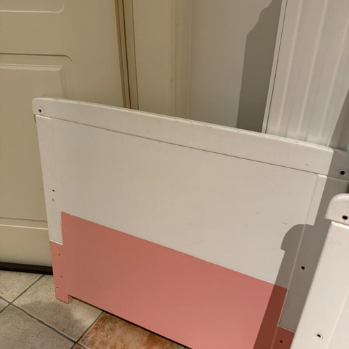 Wooden baby cot, white and pink with side rails