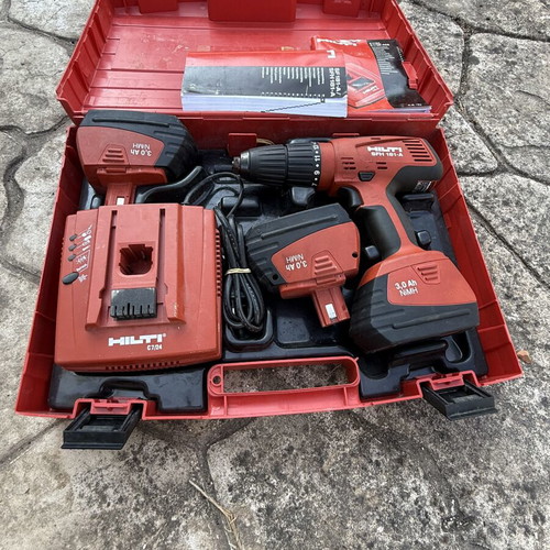 Hilti Cordless Hammer Drill like new with charger and 3 batteries