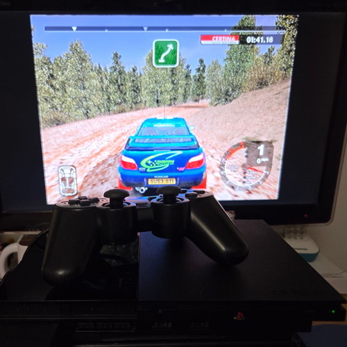 Sony PlayStation 2 SCPH-90004 Slim console used with Dualshock and memory card
