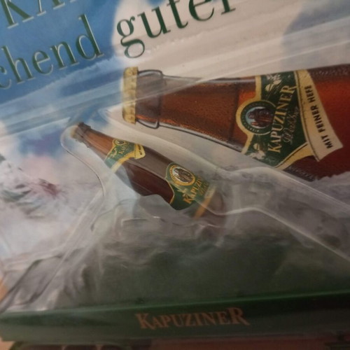 Truck - Articulated lorry in H0 scale - beer advertisement with bottle and ice mountain - Kapuziner