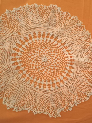 Crochet doily used with small hole