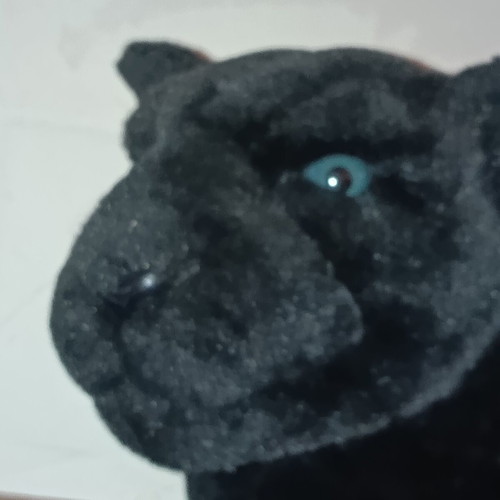 Large plush black panther with blue eyes, like new