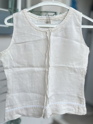 Cream linen blouse with cord and decorative edges