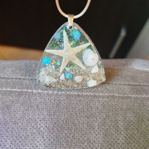 Handmade pendant with resin and beige sea elements new