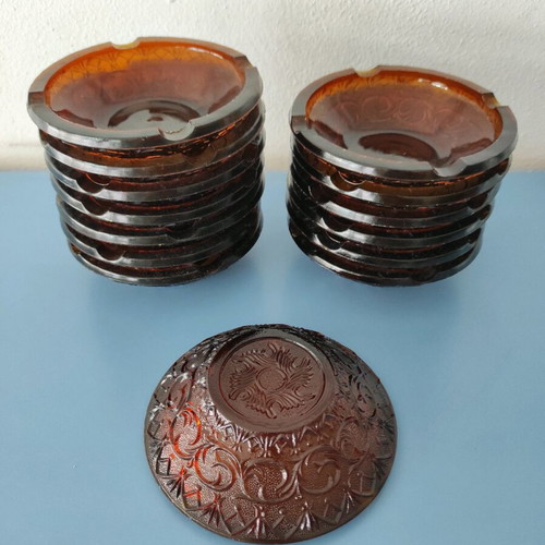Brown glass ashtrays set of 14 like new