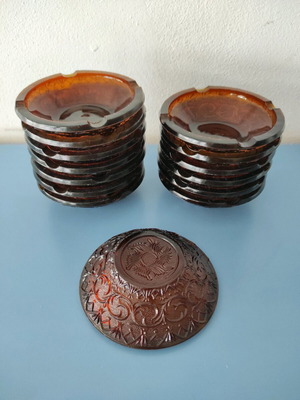 Brown glass ashtrays set of 14 like new