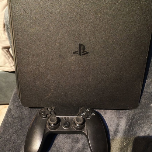 PlayStation 4 console used, 1TB storage, excellent condition