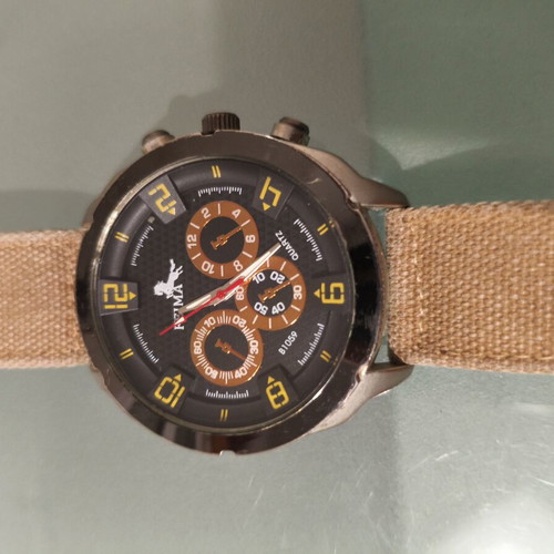 FEMA Quartz B1059 men's watch used, beige fabric strap