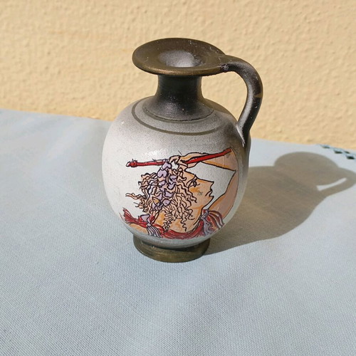Small amphora new, black color with design and one handle