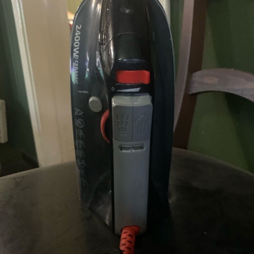 Ceramic steam iron used with steam and water outlets