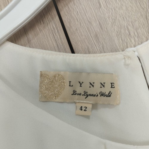 Lynne sleeveless women's blouse like new, white size 42
