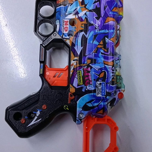 X-Shot Skins Menace toy gun used with 5 darts, graffiti design