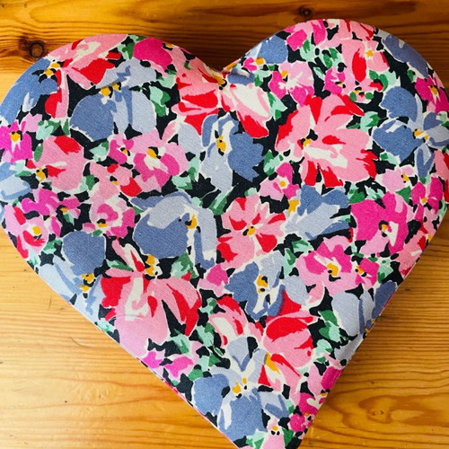 Heart-shaped gift box used with flowers, paper covered with fabric