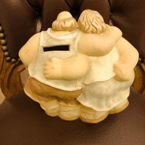 Piggy bank with couple new