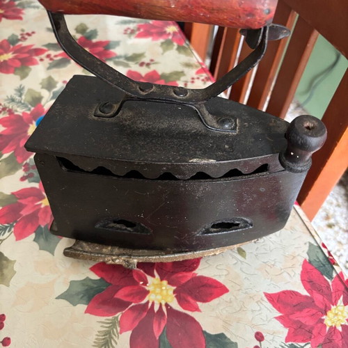 Iron with base and charcoal used