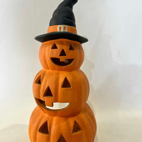 Ceramic Halloween pumpkin candle holder used