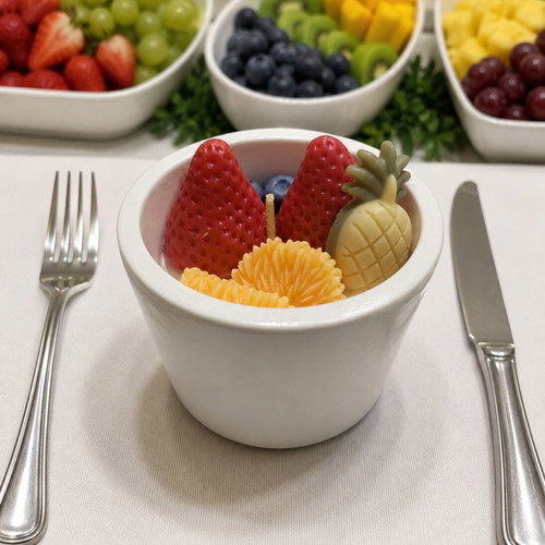 Handmade scented fruit candle in reusable porcelain powder container