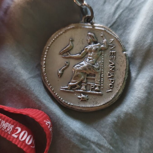 Olympus Marathon 2009 medal like new, authentic finishers medal