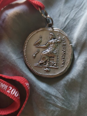 Olympus Marathon 2009 medal like new, authentic finishers medal
