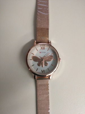 Women's watch new with embossed gold butterfly, pink-gold color