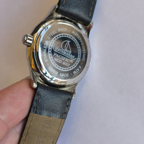 Catamaran Pacific wristwatch used, unisex, black leather strap worn