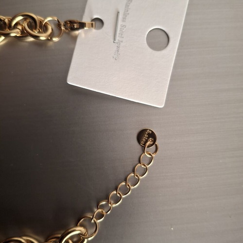 Stainless steel bracelet with gold-colored charms, new