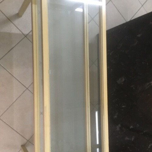 Console used with wooden frame and glass surfaces