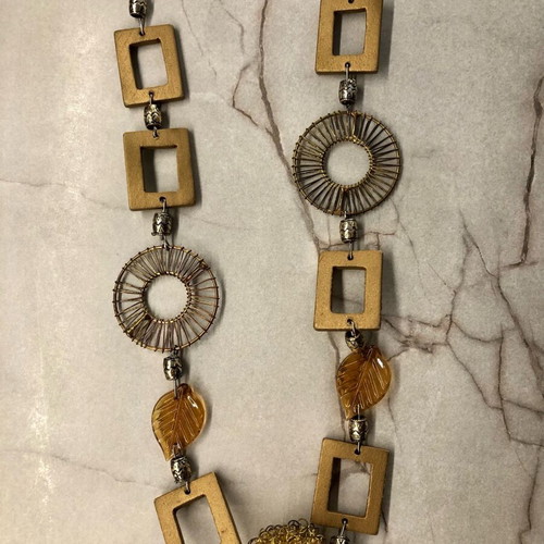 Boho necklace with gold details and velvet black cord like new