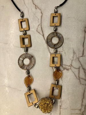 Boho necklace with gold details and velvet black cord like new