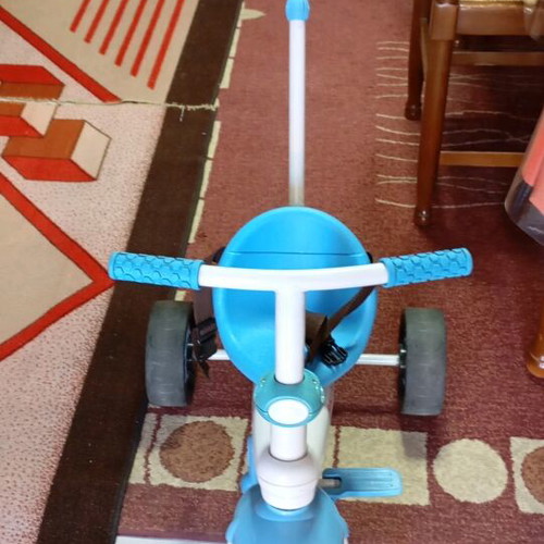Fisher Price children's bike like new with straps and handle