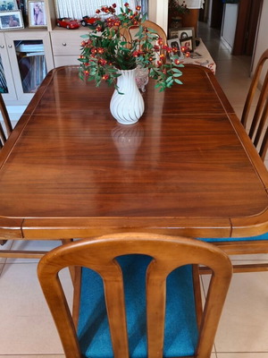 Wooden dining table with six chairs