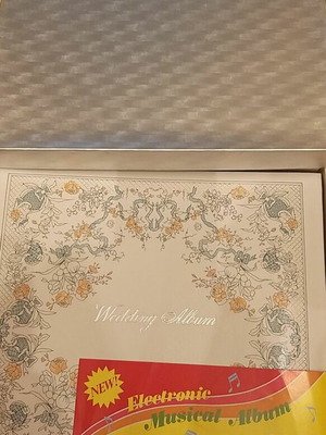 NCL electronic musical wedding photo album, floral design