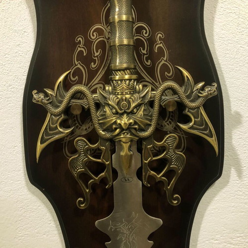 Decorative sword used on wooden wall mount with stainless steel blade