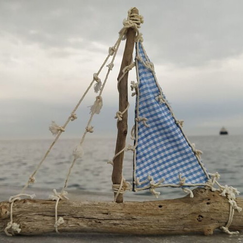 Decorative handmade boat new with driftwood