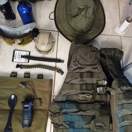 Tactical pack used, assorted gear items