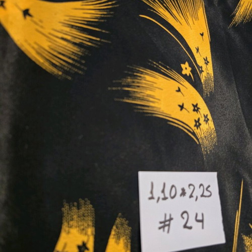 Sewing fabric new with yellow flowers on black background