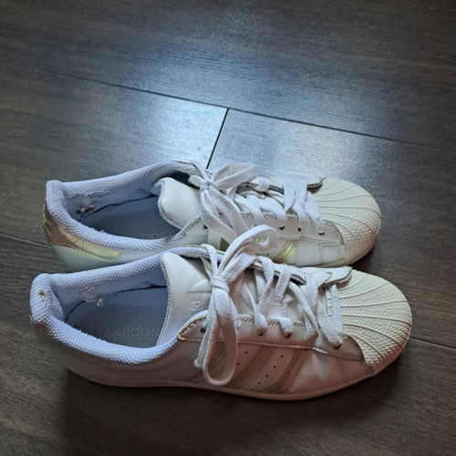 Adidas women's shoes with iridescent stripes