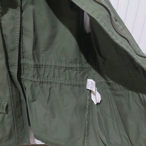 Khaki sleeveless jacket used, size M