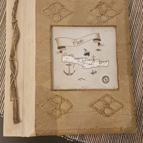 Handmade photo album from Crete with leaves and wood