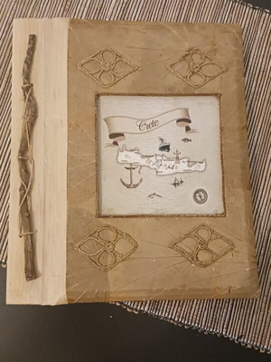 Handmade photo album from Crete with leaves and wood