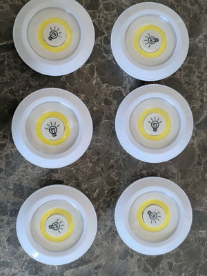 Set of 6 used battery-powered LED spotlights with remote control